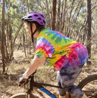Mountain bike coaching session in forest trail